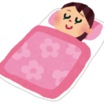 布団で寝ている女性の絵